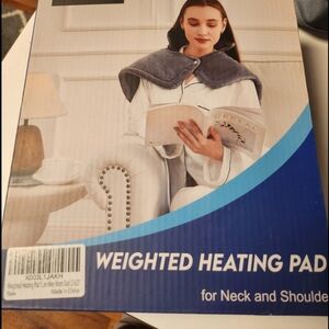 Weighted heating pad